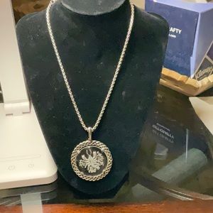 A beautiful pendant with the Cancer Zodiac sign cut in glass